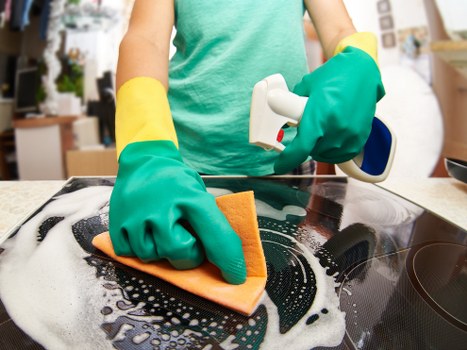 Professional hot water extraction cleaning a carpet in Herne Hill